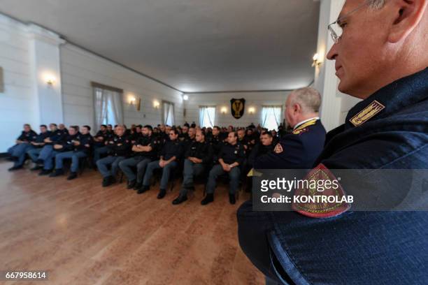 Briefing in classroom with anti-riot policemen during the training and on street operations in Naples. The anti-riot department is one of most active...
