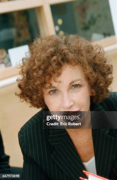 French actress Marlene Jobert reads to children in support of the Bayer Sante Foundation. Governed by the Foundation of France, Bayer Sante...
