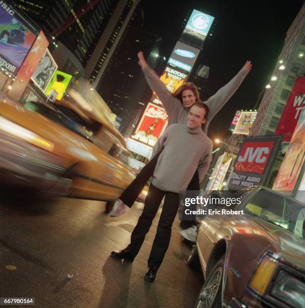 Muriel Amori, an American writer who is popular in France, and her husband Gareth Evans in Times Square. She wrote Le Beau Sexe, her first novel,...