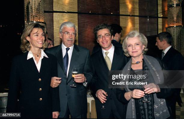 French film producer Daniel Toscan du Plantier poses with his ex-wife, actress Marie-Christine Barrault and their son David Toscan du Plantier at a...