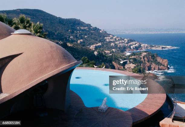 Le Palais Bulles, or The Bubble Palace, sits atop a hillside in Theoule-sur-Mer in the French Riviera, overlooking the Mediterranean Sea. The...