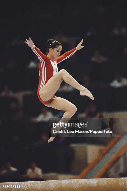 Russian gymnast Nellie Kim pictured in action competing for the Soviet Union on the balance beam during the final of the women's artistic team...