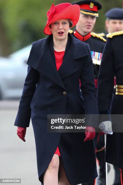 British Prime Minister Theresa May arrives for the Sovereign's Parade at Royal Military Academy Sandhurst on April 13, 2017 in Camberley, England. Ms...