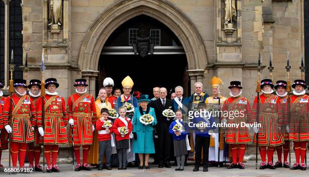 Queen Elizabeth II and Prince Philip, Duke of Edinburgh pose with Yeoman of the Guard following the Royal Maundy service at Leicester Cathedral on...