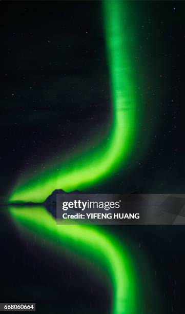chasing green - ilulissat stock pictures, royalty-free photos & images