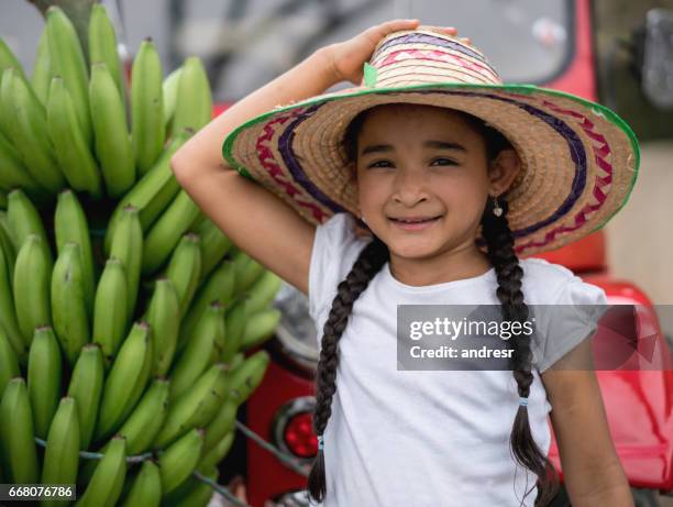 happy girl in front of a car at the farm - banana plantation stock pictures, royalty-free photos & images
