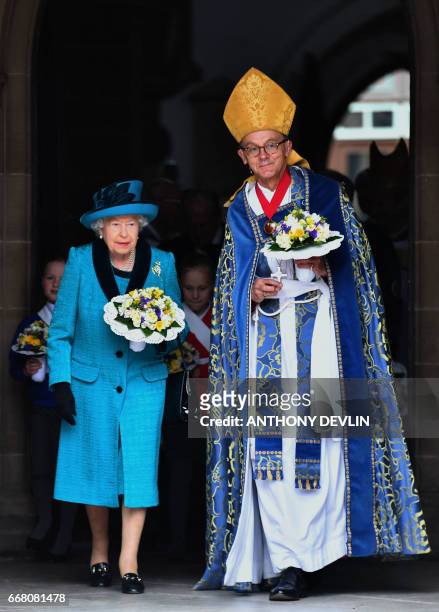 Britain's Queen Elizabeth II leaves following the Royal Maundy service at Leicester Cathedral on April 13, 2017 in Leicester.