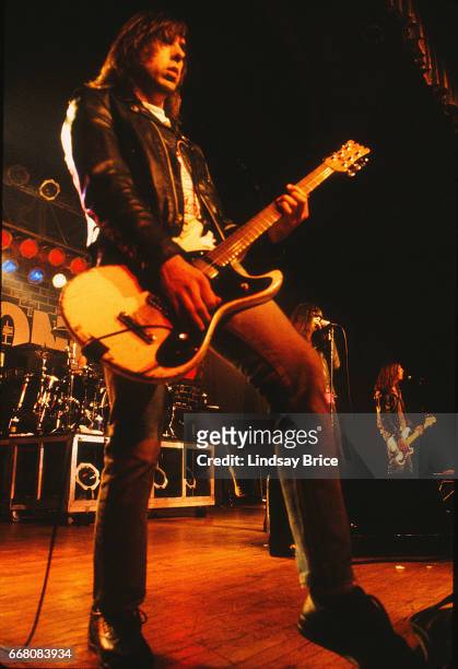 Johnny Ramone of the Ramones plays guitar with Joey Ramone and CJ Ramone in performance at the Hollywood Palladium on October 16, 1992 in Los...