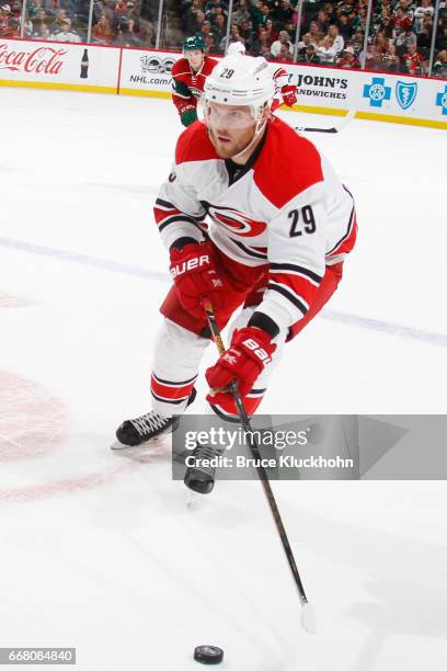 Bryan Bickell of the Carolina Hurricanes handles the puck against the Minnesota Wild during the game on April 4, 2017 at the Xcel Energy Center in...