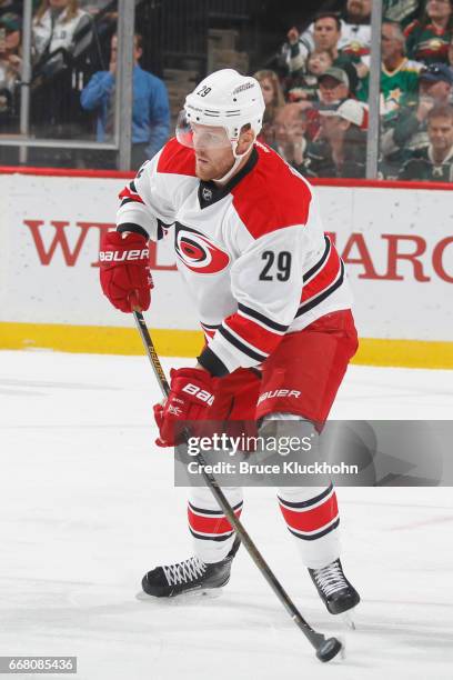 Bryan Bickell of the Carolina Hurricanes handles the puck against the Minnesota Wild during the game on April 4, 2017 at the Xcel Energy Center in...