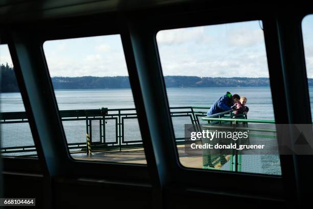 brother and sister aboard a ferry - vashon island stock pictures, royalty-free photos & images