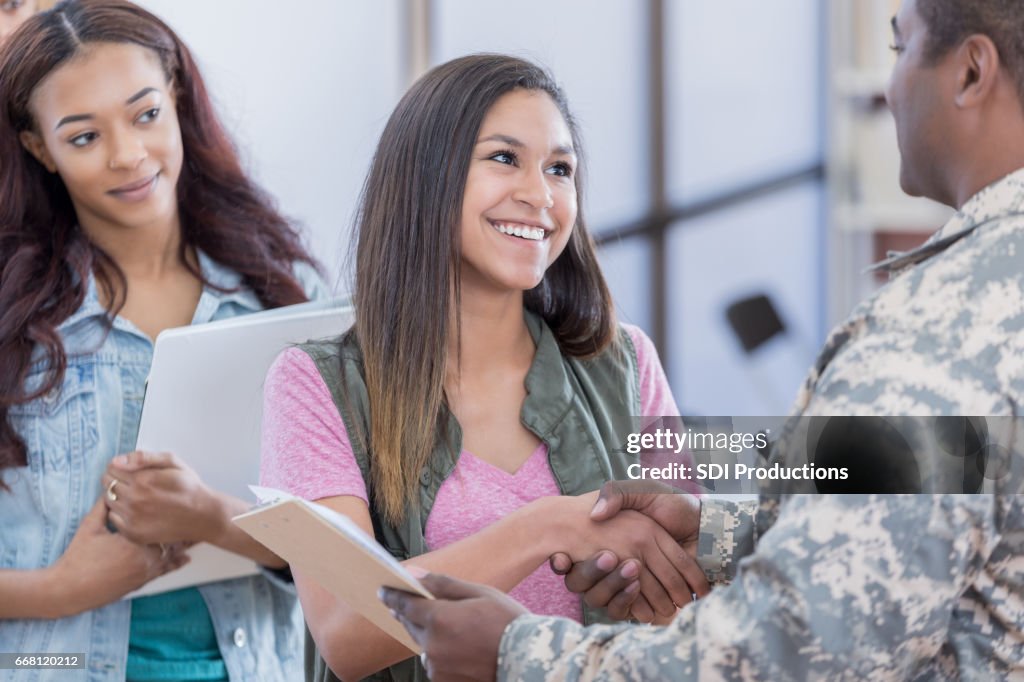 Young woman greets recruitment officer