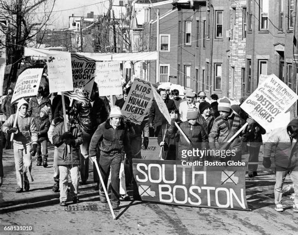 An antibusing march takes place on G Street in South Boston on Mar. 4, 1976. New bus route assignments for Boston students to newly desegregated...
