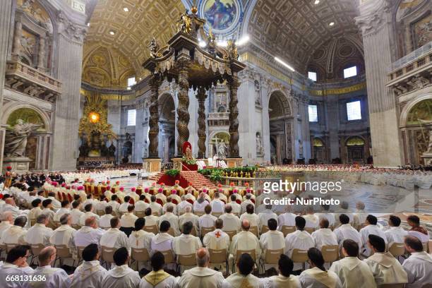 Pope Francis leads the Chrism Mass for Holy Thursday which marks the start of Easter celebrations in St. Peter's Basilica in Vatican City, Vatican....