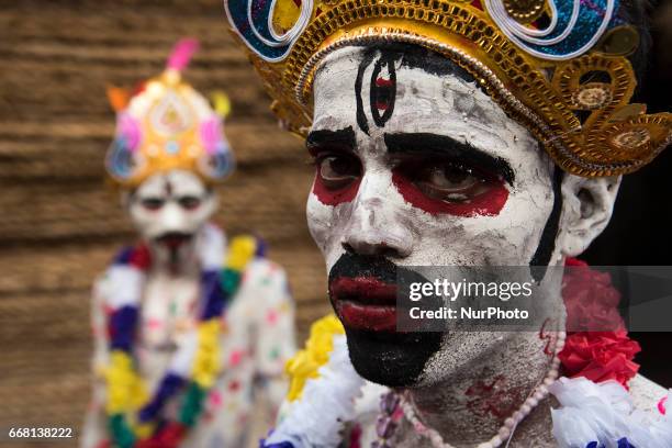 Performer has dressed himself up as a cosmetic deity, locally known as &quot;soung of gajan&quot; in Burdwan, India on 13 April 2017....