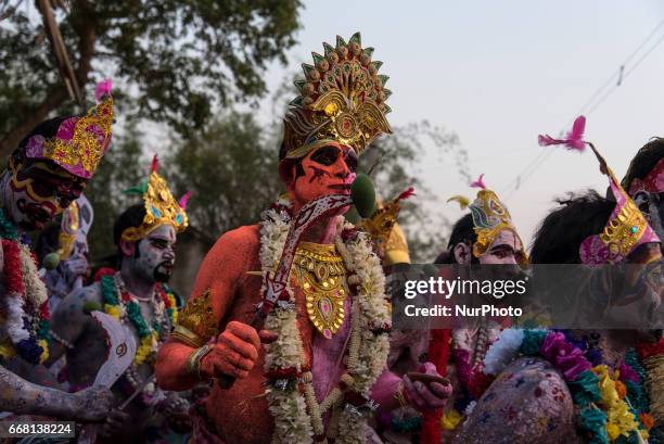 Soung of gajan is performing while the other soungs are watching his acts in Burdwan, India on 13 April 2017. &quot;Gajan&quot; is one of the...