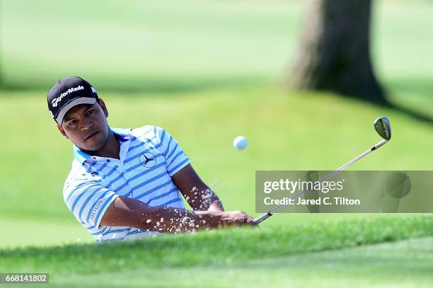 Fabian Gomez of Argentina plays his third shot out of the bunker on the ninth hole during the first round of the 2017 RBC Heritage at Harbour Town...