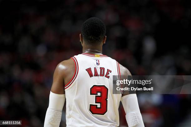 Dwyane Wade of the Chicago Bulls walks across the court in the third quarter against the Brooklyn Nets at United Center on April 12, 2017 in Chicago,...