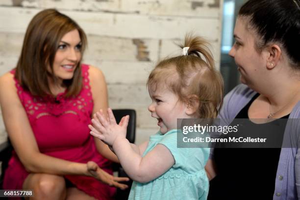 Boston Children's Hospital patient Avery, and Mom Jess, prepare for a shoot for HAIRraising, an event benefitting Boston Children's Hospital at Salon...