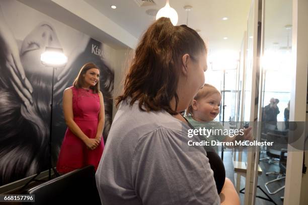 Boston Children's Hospital patient Avery, and Mom Jess, prepare for a shoot for HAIRraising, an event benefitting Boston Children's Hospital at Salon...