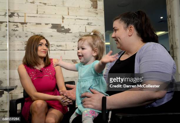 Boston Children's Hospital patient Avery, and Mom Jess, prepare for a shoot for HAIRraising, an event benefitting Boston Children's Hospital at Salon...