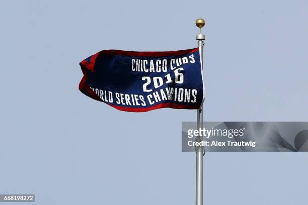 The 2016 World Series Champions banner is seen prior to the game between the Los Angeles Dodgers and the Chicago Cubs at Wrigley Field on Wednesday,...