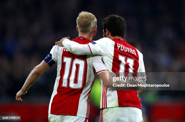 Davy Klaassen of Ajax celebrates with Amin Younes of Ajax after he scores his sides first goal during the UEFA Europa League quarter final first leg...