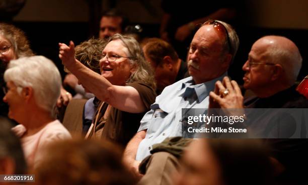 An attendee reacts during a town hall meeting held by Rep. Joe Barton at Mansfield City Hall on April 13, 2017 in Mansfield, Texas. A capacity crowd...