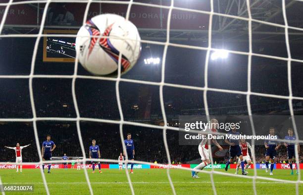 Davy Klaassen of Ajax scores his sides first goal during the UEFA Europa League quarter final first leg match between Ajax Amsterdam and FC Schalke...