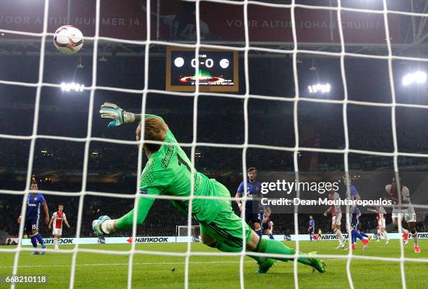 Ralf Fahrmann of FC Schalke 04 makes a save during the UEFA Europa League quarter final first leg match between Ajax Amsterdam and FC Schalke 04 at...