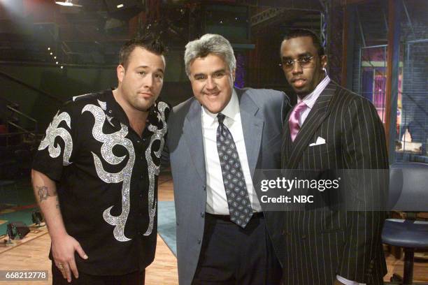 Pictured: Musician Uncle Kracker posing with Host Jay Leno and Rapper Sean Combs on July 17th, 2001 --