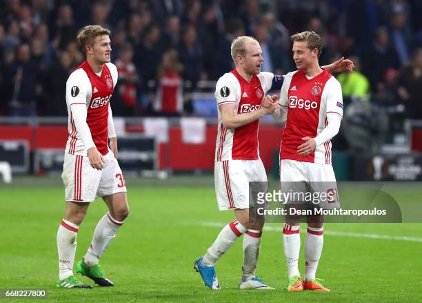 Davy Klaassen of Ajax and Frenkie de Jong of Ajax celebrate after the full time whistle during the UEFA Europa League quarter final first leg match...