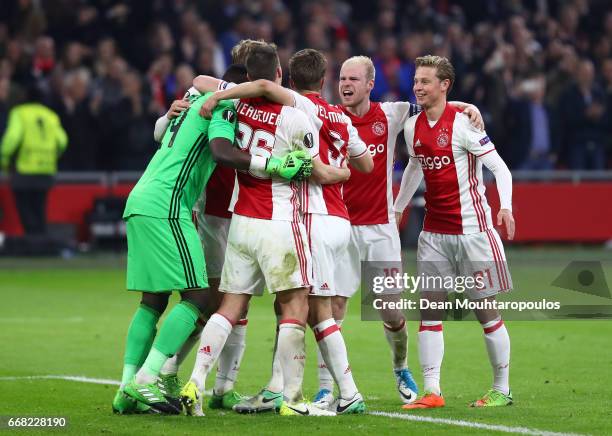 Ajax celebrate after the full time whistle in the UEFA Europa League quarter final first leg match between Ajax Amsterdam and FC Schalke 04 at...