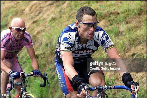 Lance Armstrong, right, and Marco Pantani ride in the 10th stage of the Tour de France July 10, 2000 en route to Lourdes-Hautacam, France. Armstrong...