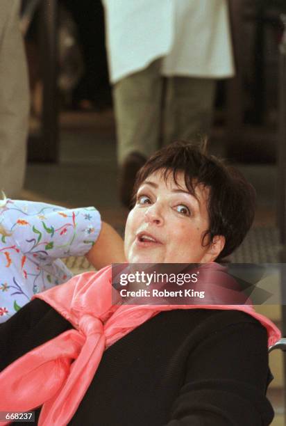 Performer Liza Minnelli is wheeled out of the hospital October 30, 2000 after being released from the Cleveland Clinic Hospital in Fort Lauderdale,...