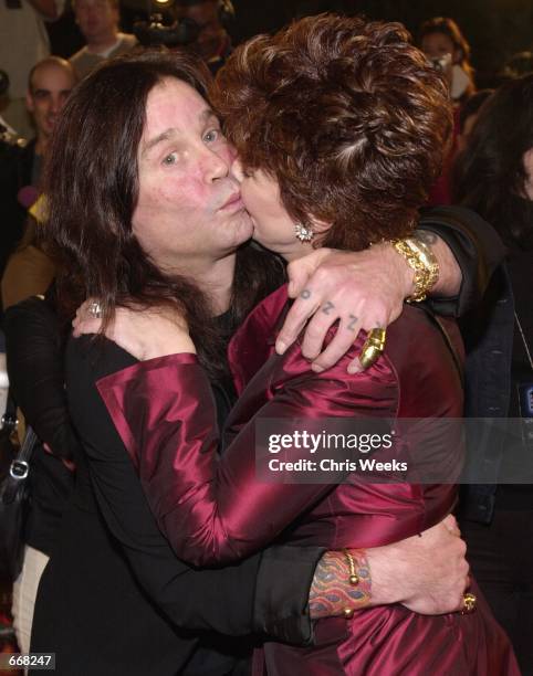 Singer Ozzy Osbourne and wife Sharon Arden kiss at the premiere of New Line's "Little Nicky" November 2, 2000 at Mann's Chinese Theatre in Hollywood,...