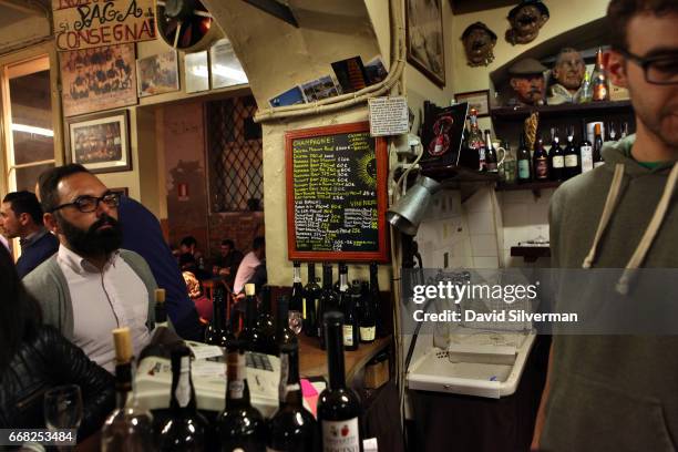 Blackboard menu lists the drinks available at the Osteria Del Sole bar on March 30, 2017 in Bologna, Italy. Situated on Via Ranocchi, an alleyway in...