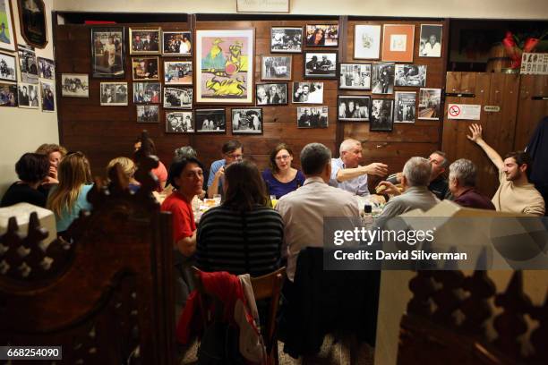 An Italian family holds a private party in a side room at the Osteria Del Sole bar on March 30, 2017 in Bologna, Italy. Situated on Via Ranocchi, an...