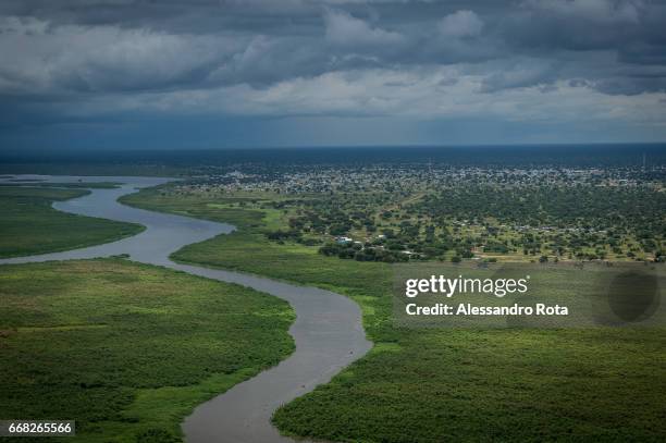 South-Sudan, aerial views of Mingkaman on the White Nile. The village used to be a small rural community which is now becoming a growing town with...