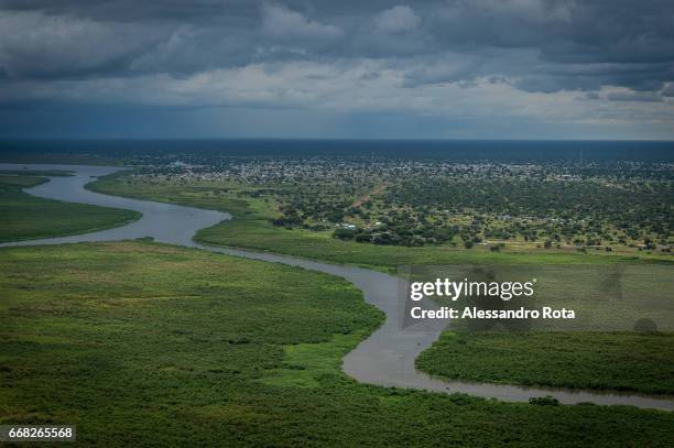 South-Sudan, aerial views of Mingkaman on the White Nile. The village used to be a small rural community which is now becoming a growing town with...