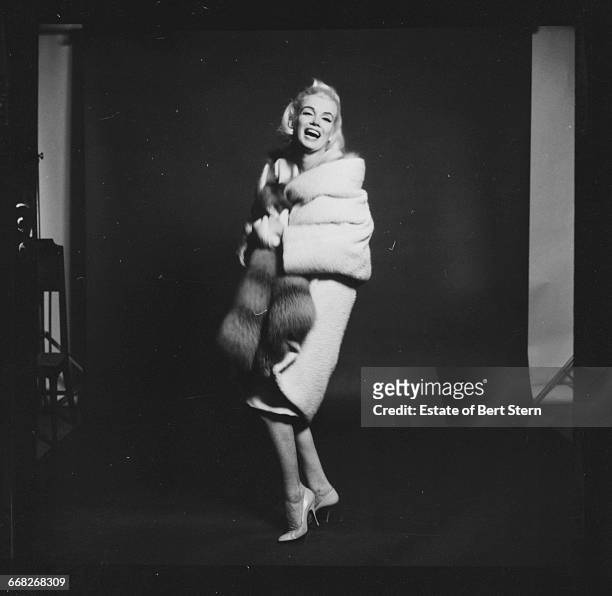 American actress Marilyn Monroe , wearing a fur-lined white coat, Beverly Hills, California, July 1962. The two sessions for the photoshoot took...