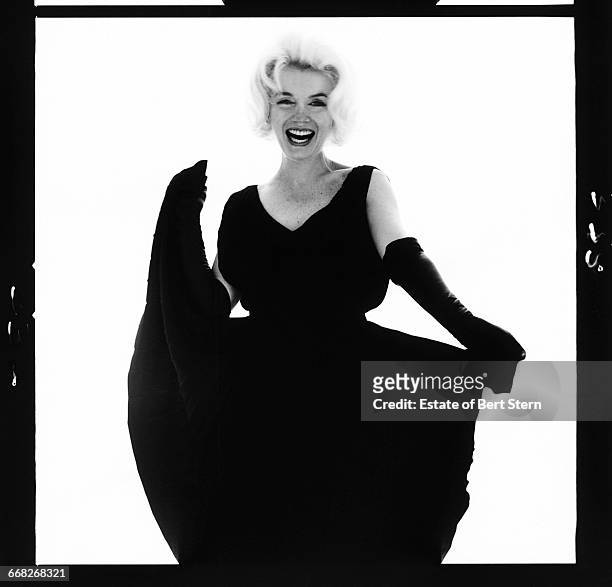 American actress Marilyn Monroe , wearing a black dress, Beverly Hills, California, July 1962. The two sessions for the photoshoot took place in late...