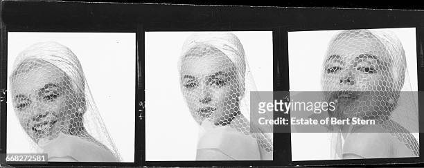Three portraits of American actress Marilyn Monroe wearing a white veil, Beverly Hills, California, July 1962. The two sessions for the photoshoot...