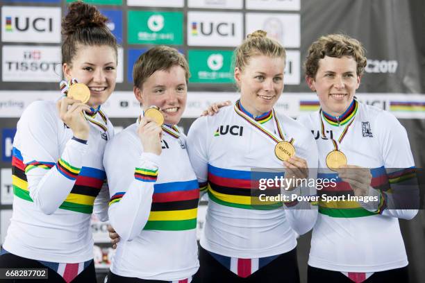 The team of USA with Kelly Catlin, Chloe Dygert, Kimberly Geist and Jennifer Valente celebrates winning the Women's Team Pursuit Finals during 2017...