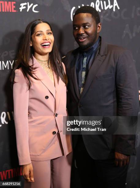 Freida Pinto and Babou Ceesay arrvie at Showtime's "Guerrilla" FYC event held at The WGA Theater on April 13, 2017 in Beverly Hills, California.