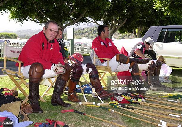 Actor Tommy Lee Jones, left, rests with his polo team, San Saba, July 16, 2000 at the Santa Barbara Polo Club in Santa Barbara, CA, where they...