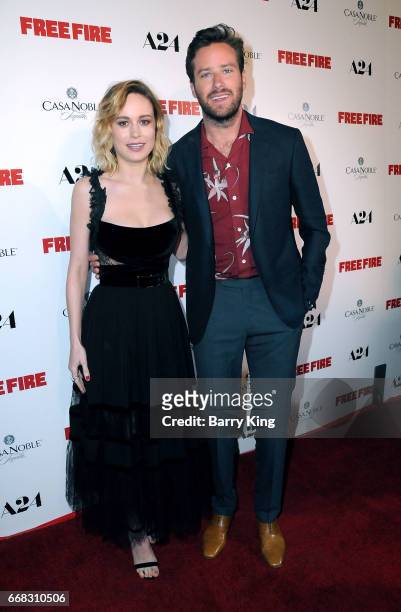 Actress Brie Larson and actor Armie Hammer attend the premiere of A24's' 'Free Fire' at ArcLight Hollywood on April 13, 2017 in Hollywood, California.