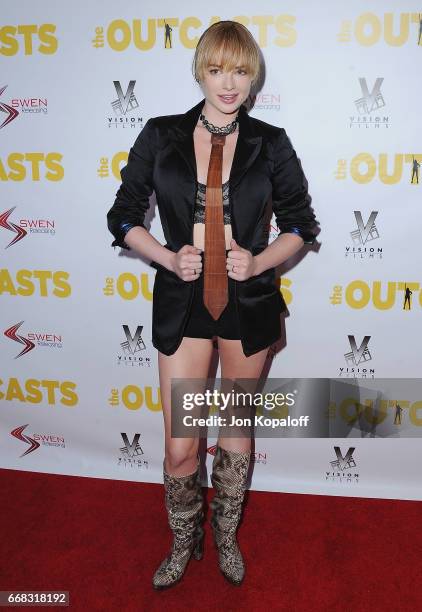 Actress Ashley Rickards arrives at the Los Angeles Premiere "The Outcasts" at Landmark Regent on April 13, 2017 in Los Angeles, California.