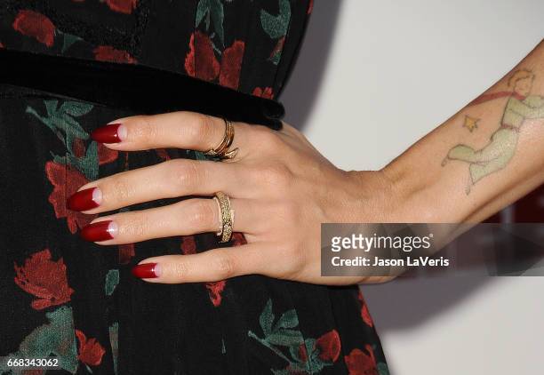 Actress Natalie Morales, jewelry and nail detail, attends the premiere of "Free Fire" at ArcLight Hollywood on April 13, 2017 in Hollywood,...