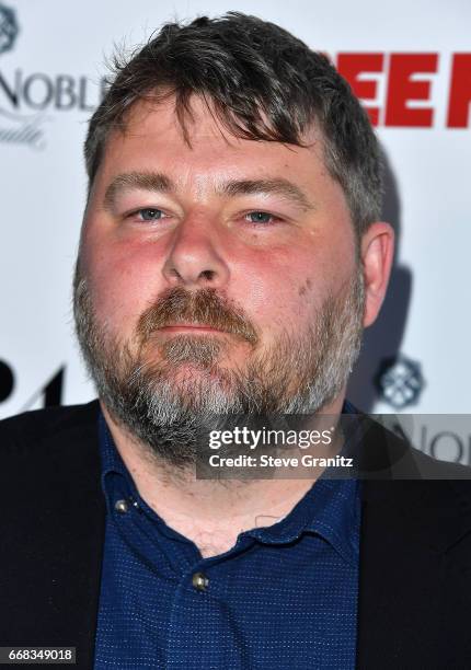 Director/writer Ben Wheatley arrive at the Premiere Of A24's "Free Fire" at ArcLight Hollywood on April 13, 2017 in Hollywood, California.